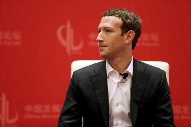 Facebook's Zuckerberg meets propaganda czar in China charm drive