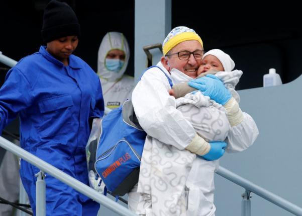 Italy rescues 2,400 boat migrants, finds three corpses