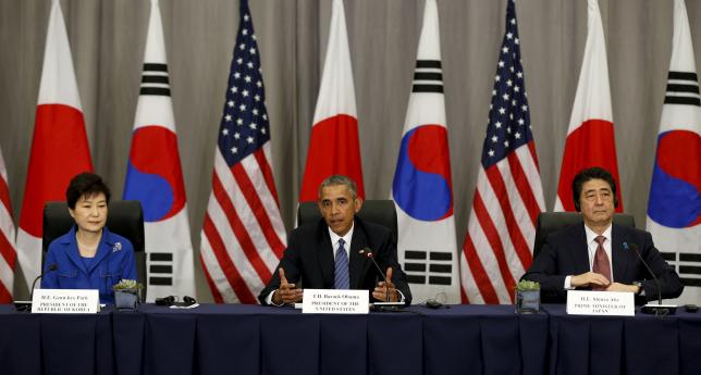 Leaders of US, Japan, South Korea present united front against North Korea