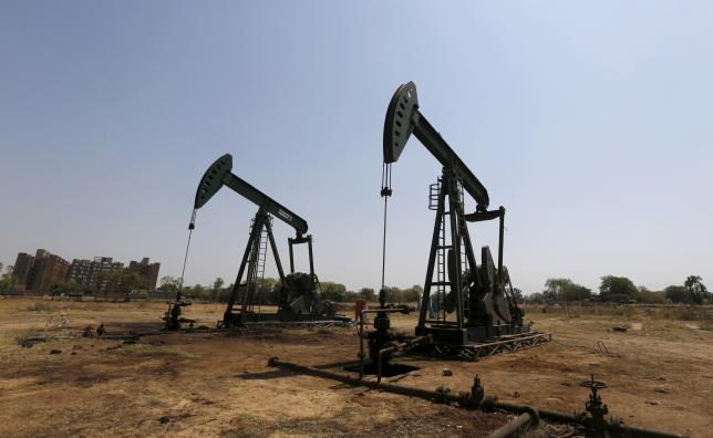 Oil prices regain ground, but growing stocks loom