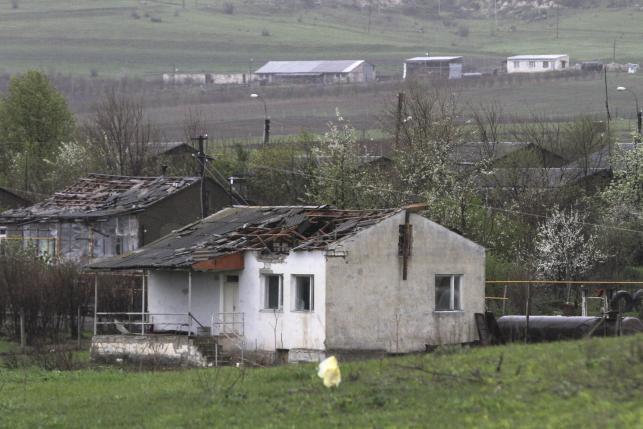 Azerbaijan says to stop fighting in Nagorno-Karabakh, separatists voice doubts