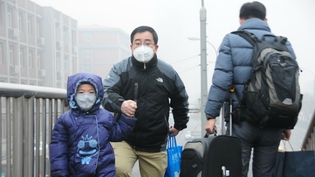 China launches pollution probe after hundreds of students fall sick