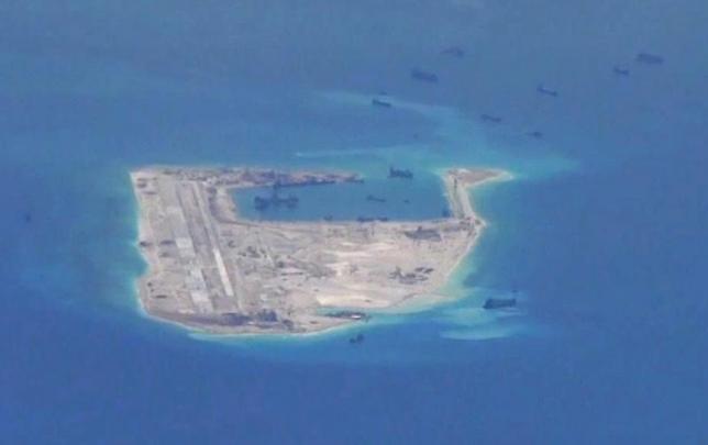 Chinese military aircraft makes first public landing on disputed island