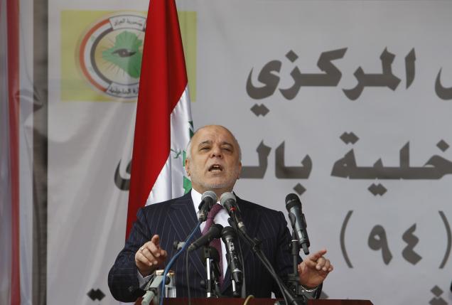 US, Iran keep Iraqi PM in place as he challenges ruling elite