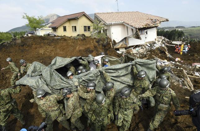 Japan quake survivors struggle with shortages, search for missing goes on