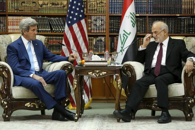 Kerry urges Iraq not to let politics impede war against IS