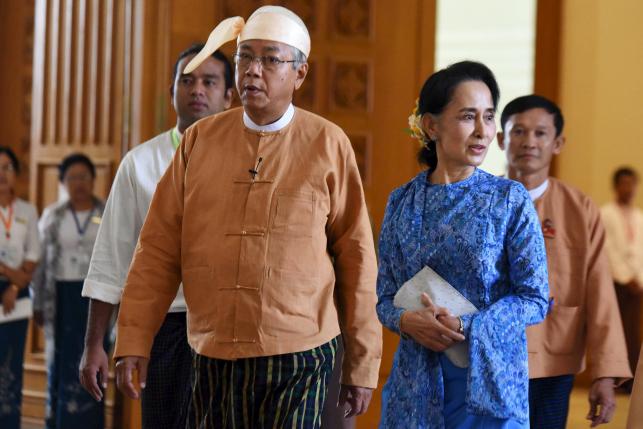 Myanmar's ruling party, military clash over Suu Kyi role