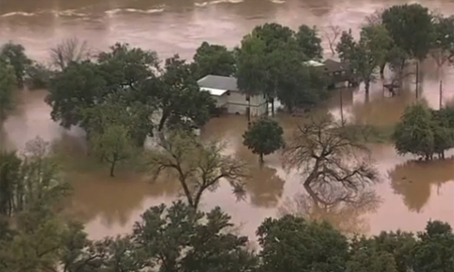 Floods in Texas cause flight cancellations, power outages