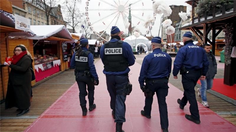 Belgian police arrest 12 suspected of planning new attacks