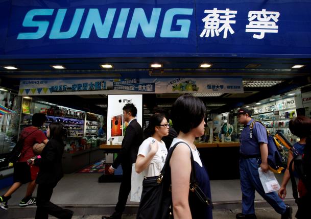 As Inter deal nears, Chinese retail giant Suning eyes football empire