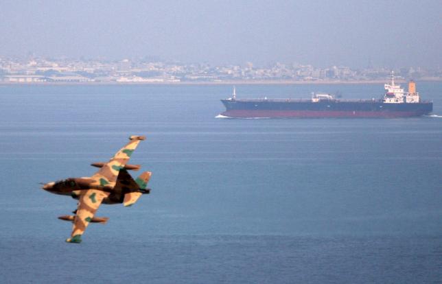 As Iran's oil exports surge, international tankers help ship its fuel