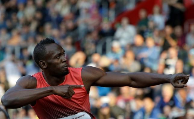 Bolt staves off false starts to move into 100m semi-finals