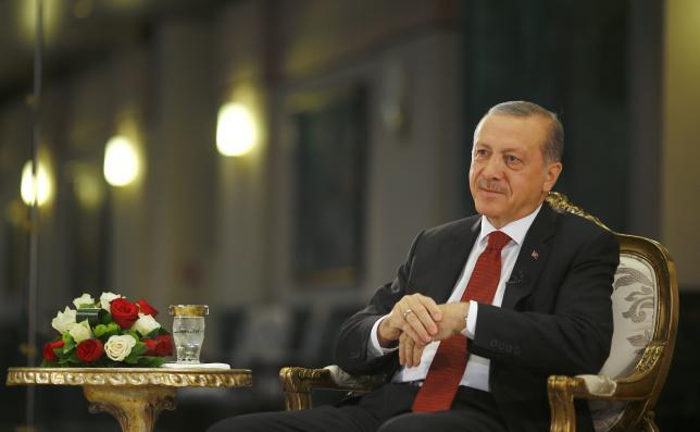 Erdogan vows Turkish military shake-up as emergency rule takes hold
