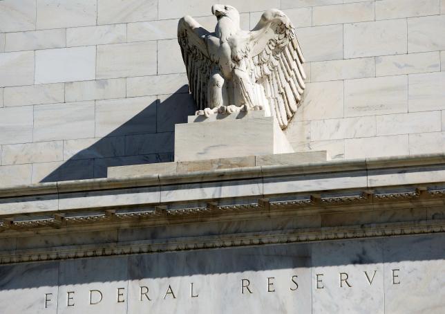 Federal Reserve leaves rates unchanged, says risks to outlook reduced