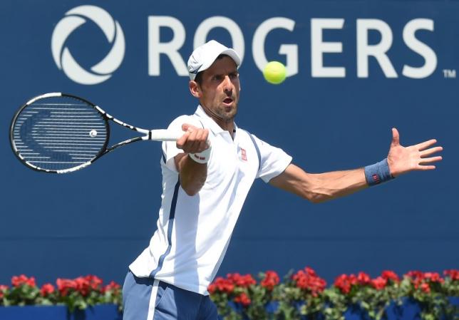 Djokovic survives test to reach third round in Toronto