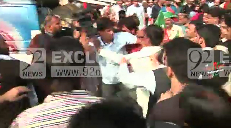 PTI files reference against PM & his family; workers scuffle with each other