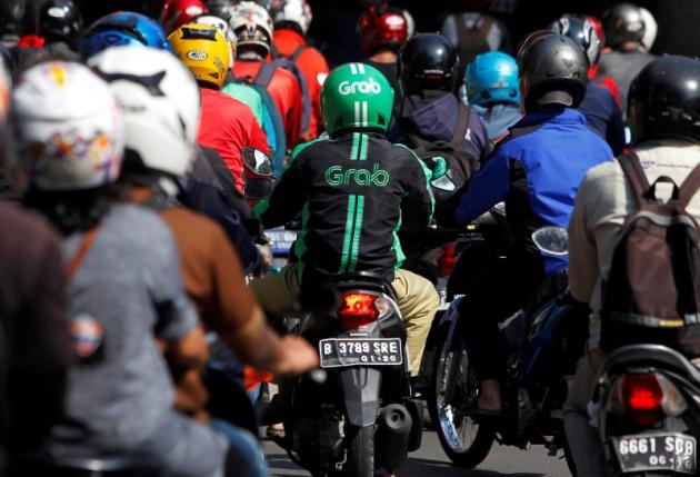 Ride-hailing service Grab partners Indonesia's Lippo for mobile payments