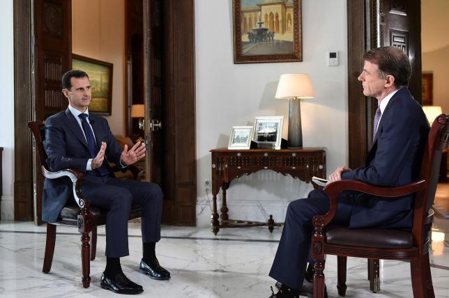 Syria's Assad says Putin has not talked about political transition