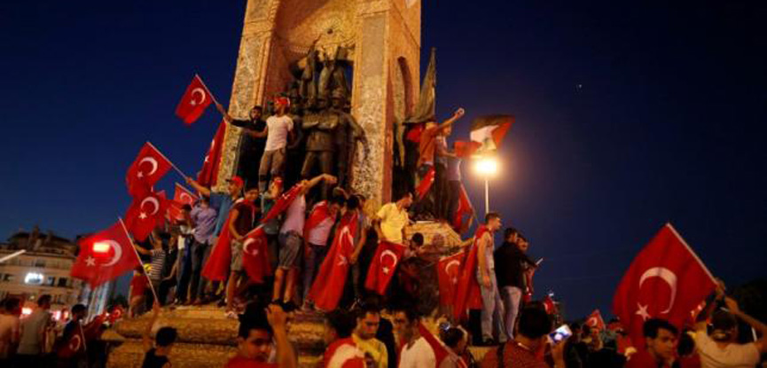 Erdogan supporters stand guard as crushed coup bid shakes Turkey