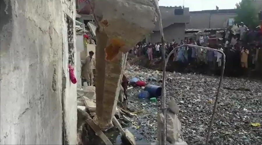Woman drowns as house collapses during cleaning of a drain