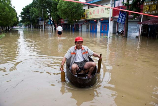 Floods in China kill almost 130, wipe out crops