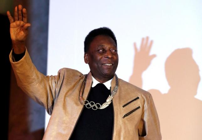 Pele asked to light Rio pyre, checks with sponsors