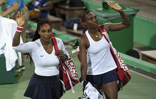 Tennis: Williams sisters crash out of doubles