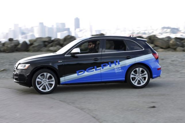 Delphi, Singapore launch test of self-driving taxis
