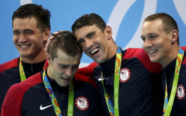 More records fall as Phelps collects 19th gold