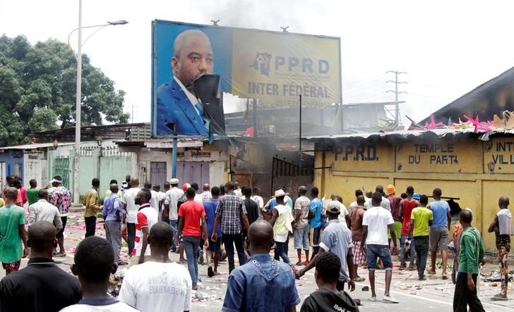 Armed men torch Congo opposition HQ after deadly protests