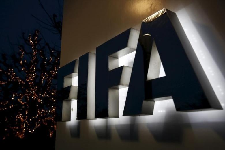 Plea talks under way in FIFA bribery case as US trial date set