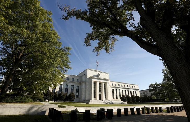 Fed again poised to cut longer-run interest rate forecast