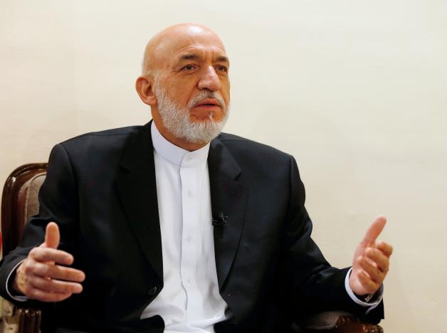 Former Afghan president attacks new U.S. combat rules