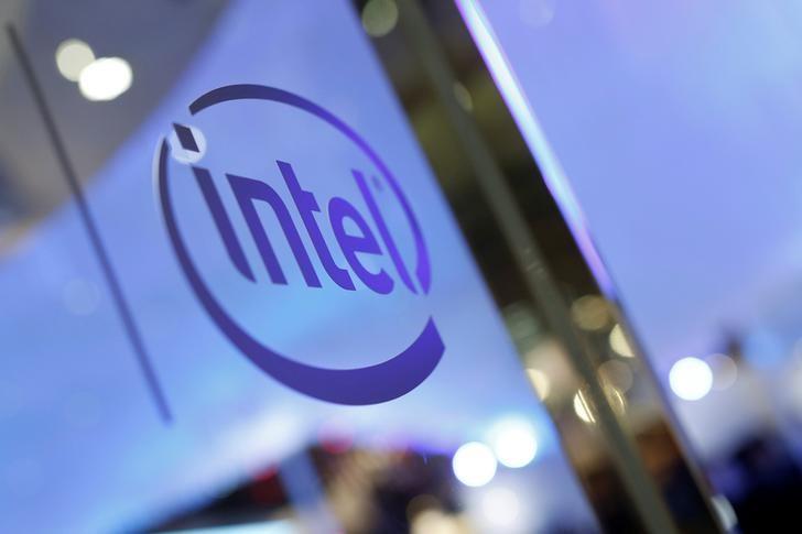 Intel raises revenue forecast as PC market improves