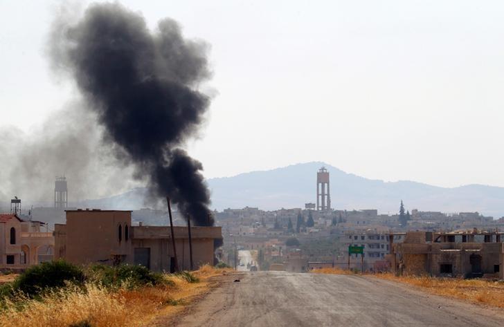 Jets bomb Syrian rebels as they wage big attack in Hama province