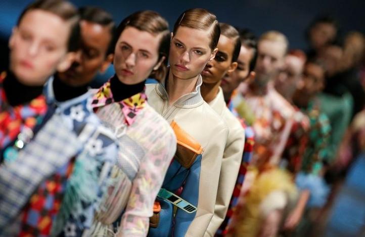 Feathers and nostalgia add glam to Prada spring collection