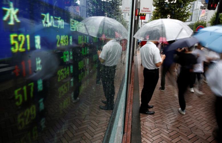 Asian shares rise on Fed optimism, sterling firms on expected BOE hike