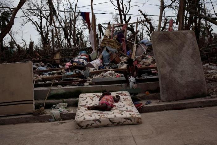 Hurricane Matthew toll in Haiti rises to 1,000, dead buried in mass graves