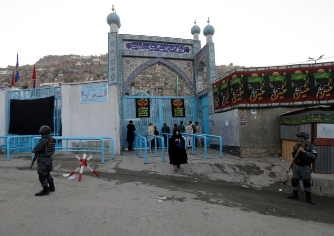 Gunman kills 14 at shrine in Afghan capital, police say