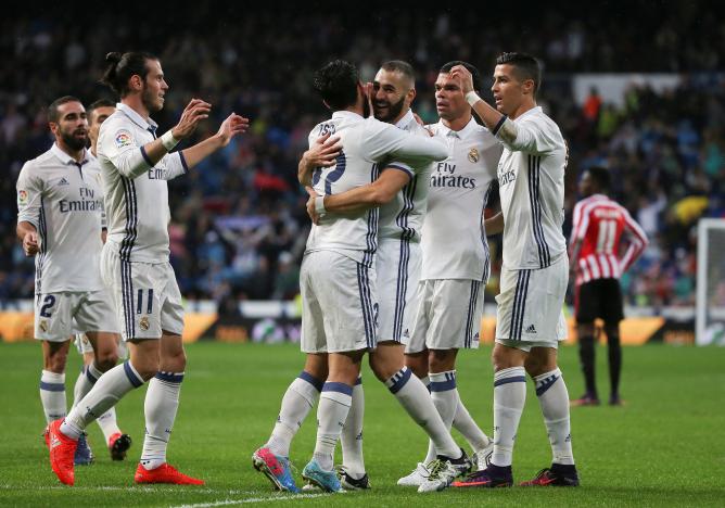 Morata strikes late to send Real Madrid top of La Liga