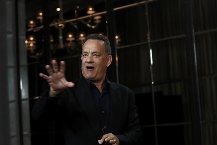 Tom Hanks wins tabloid apology over crumbling marriage claims