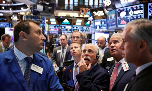Wall Street slips as financial, tech stocks weigh