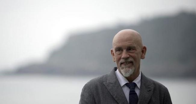 Actor Malkovich wins libel suit over Le Monde tax story