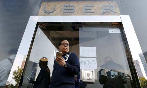 Beijing, Shanghai propose curbs on who can drive for ride-hailing services