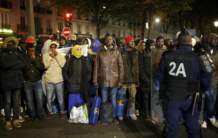 Police evacuate Paris migrant camp that grew after Calais