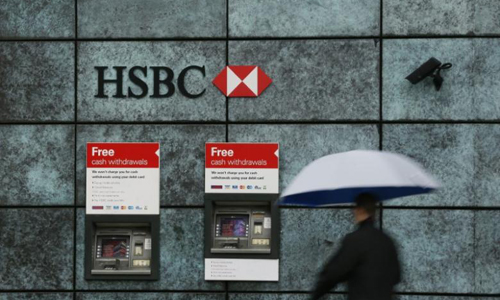 HSBC third-quarter pretax profit slumps 86 percent on Brazil unit sale charges