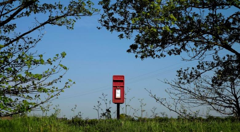 Royal Mail to cut more costs after profit fall