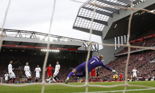 Six-goal Liverpool go top as Arsenal miss their chance