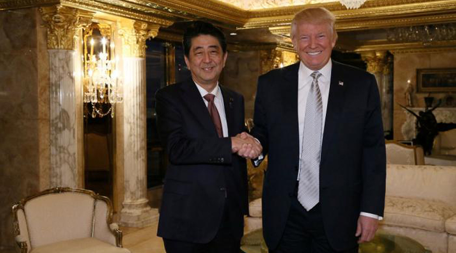 Japan's PM Abe meets Trump, says confident can build trust