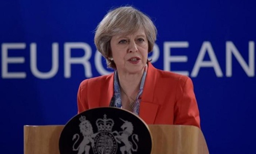 UK PM May promises EU exit 'in full' despite legal challenge